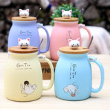 lavender, pink, yellow, and baby blue kitty cups/mugs with spoons and lids.