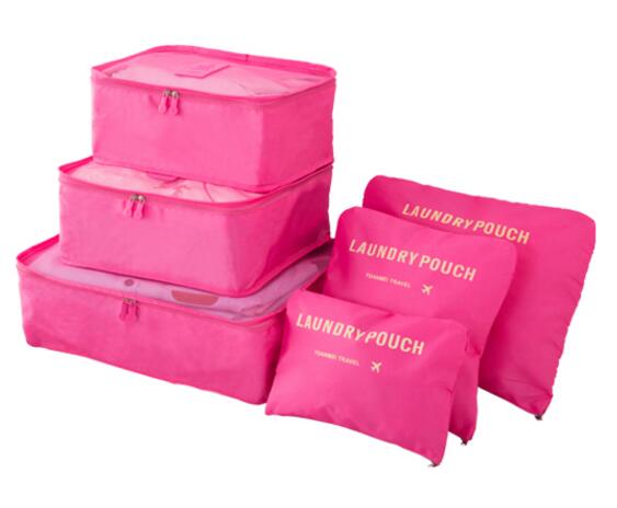 Hot pink laundry pouches and packing organizers