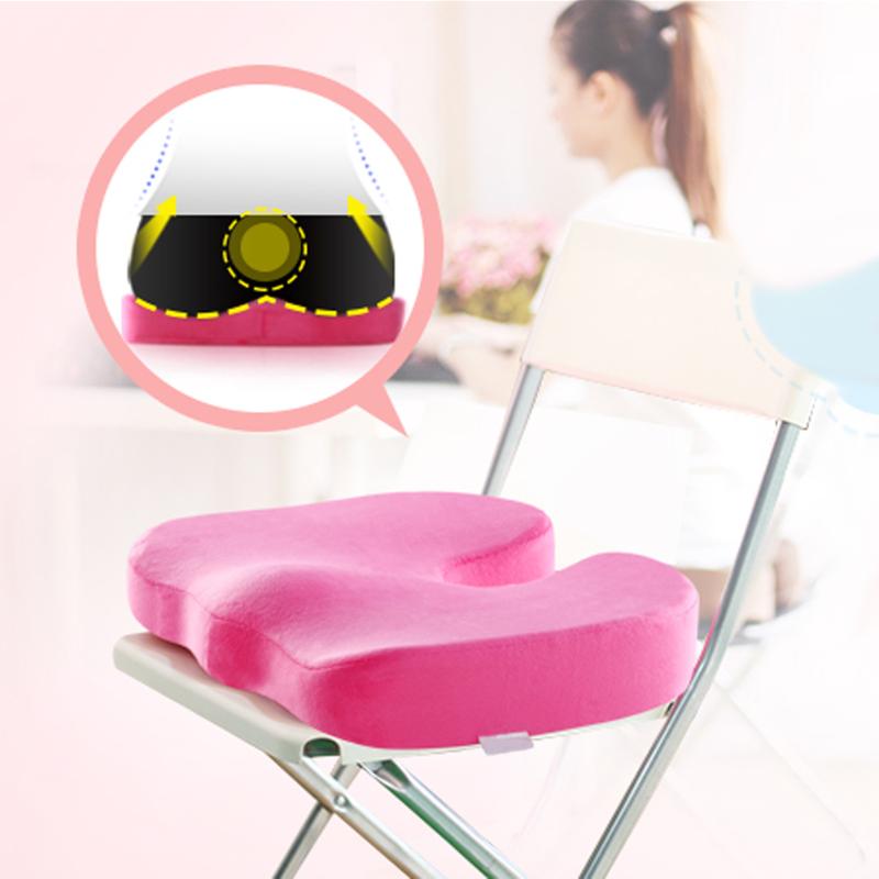 Pink Memory Foam Cushion shown on hard chair