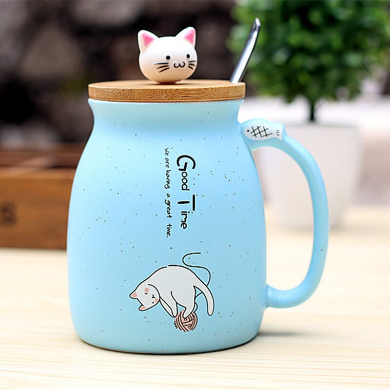 Sky blue Kitty Cup with cat graphic and ornament on cover