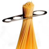 pasta in slot of measuring tool